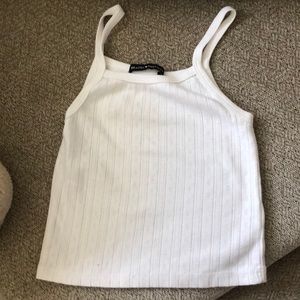 White Brandy Melville tank top.